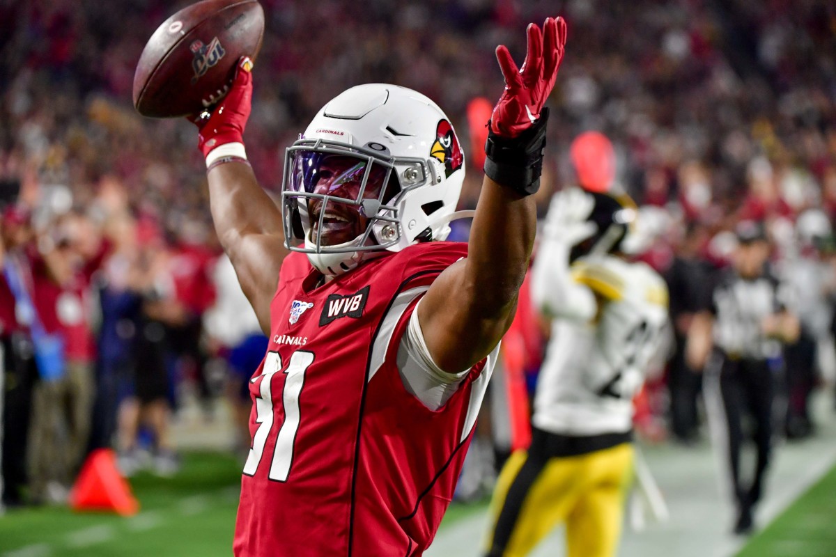 Cardinals running back David Johnson celebrates after scoring a touchdown during the second half of a 2019 game against the Steelers at State Farm Stadium.